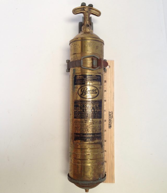 Pyrene Fire Extinguisher,1 1/2  quart ,Brass, with original mounting bracket, hand turn pump type, carbon tetrachloride, classification B-2:C-2